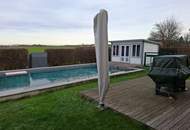 Repräsentatives Einfamilienhaus mit großen Garten, Naturpool, Wellnessbereich & autarker Energieversorgung