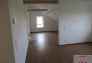 Wunderschöne neue Obergeschoss-Wohnung mit Eigengarten zu verkaufen!