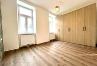 Elegante 3-Zimmerwohnung mit Balkon in saniertem Altbau