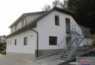 Wunderschöne neue Obergeschoss-Wohnung mit Eigengarten zu verkaufen!