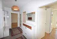 Helle Familienwohnung mit überdachter Sonnenterrasse und Eigengarten