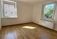 Preiswerte 3-Zimmerwohnung mit herrlichem Blick ins Grüne und flexibler Raumaufteilung! Genießen Sie die Ruhe und Idylle eines kleinen Mehrparteienhauses in zentraler Lage in Steyr Münichholz!