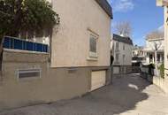 4-Zimmer-Terrassenwohnung mit ca. 100m² Garten und TG Stellplatz