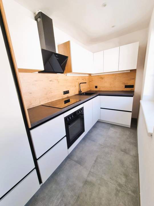 Generalsanierte 2-Zimmer-Wohnung mit Westbalkon in ruhiger Lage!