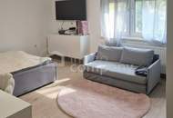 Familienwohnung mit 4 Zimmern im Zentrum mit großer Terrasse / eigene Garage - generalsaniert!