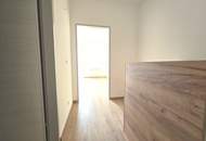 Zentrale, schöne und neu renovierte 2-Zimmer Maisonette Wohnung mit Loggia