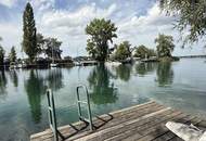 große UFERPAZRELLE mit privatem Badesteg am Neufelder See – Holzhaus mit Renovierungsbedarf beim Yachtclub auf Pachtgrund zu verkaufen