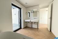 Spektakuläre Dachgeschoßmaisonette mit Terrassentraum und Blick auf die Canisiuskirche