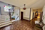 GROßZÜGIGES ZWEIFAMILIENHAUS MIT 1.548 m² TRAUMGARTEN IN ZENTRALER GRÜNLAGE