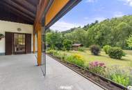 Gartenparadies in einzigartiger Naturlage: Gemütlicher Bungalow mit Wintergarten direkt an der Drau in Lavamünd