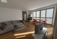 Neuwertige 2-Zimmer-Eigentumswohnung mit Kamin, Loggia und Garage