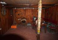 Bungalow in Siedlungsrandlage mit sensationellem Garten und Sauna-Bereich