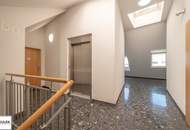 Großzügige, sonnige DG-Neubauwohnung mit hofseitiger Terrasse nahe Einkaufsstraße & U6 - ab 1.12.25!