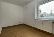 Außergewöhnliches 3-Zimmer-Familiendomizil im Grünen mit Erholungsfaktor und perfekter Infrastruktur! Helle Räume, modernes Bad und praktischer Hauswirtschaftsraum inklusive!