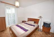 Helle Familienwohnung mit überdachter Sonnenterrasse und Eigengarten