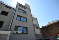 Exklusive 2‑Zimmer‑DG‑Wohnung mit sonniger Hofterrasse und Weitblick über Wien