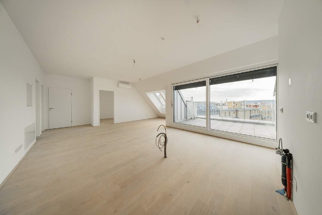 Leben über den Dächern – Exklusive Dachgeschosswohnung mit Terrasse