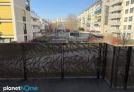 Topwohnung mit großem Balkon – neuwertig, stilvoll, mit Garage – Raumwunder