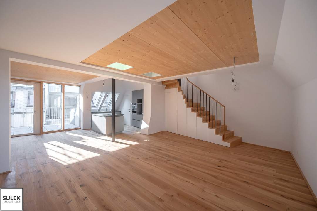 Erstbezug mit weitläufigem &amp; lichtdurchfluteten Wohnbereich, sowie 2 hofseitigen Freiflächen