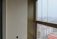 ANLEGERWOHNUNG 3,03% Rendite - Atemberaubender Blick aus dem 26. Stock des Helio Towers