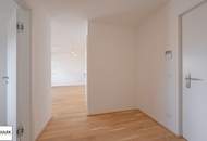 Wohnen im Bel Atrium: Zwei Zimmer Neubau Wohnung mit Balkon, inkl. Stellplatz und vielen Extras