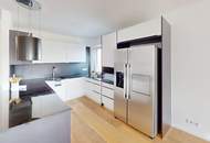 Moderne Dachgeschoss-Maisonette in Wien-Mauer mit zwei Balkonen, Garage und Liftzugang auf beiden Ebenen | ZELLMANN IMMOBILIEN