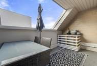 Wohnen über den Dächern von Graz mit Blick auf den Schlossberg: Exklusive Stadtwohnung mit Terrasse