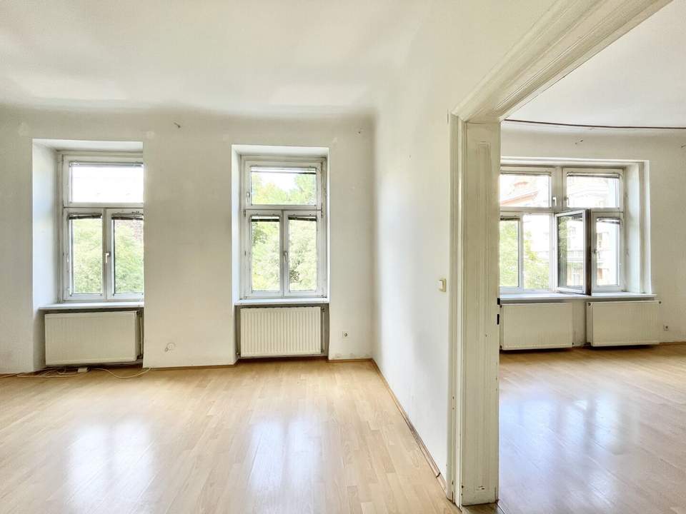 Brigittaplatz | Bezaubernde 2 Zimmer Altbau mit Potenzial &amp; Grünblick für unter € 3.650/m2