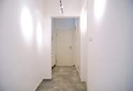 Einziehen und wohlfühlen! Moderne 2-Zimmerwohnung in Grün- und Ruhelage mit Terrasse und Eigengarten – Carport inklusive!