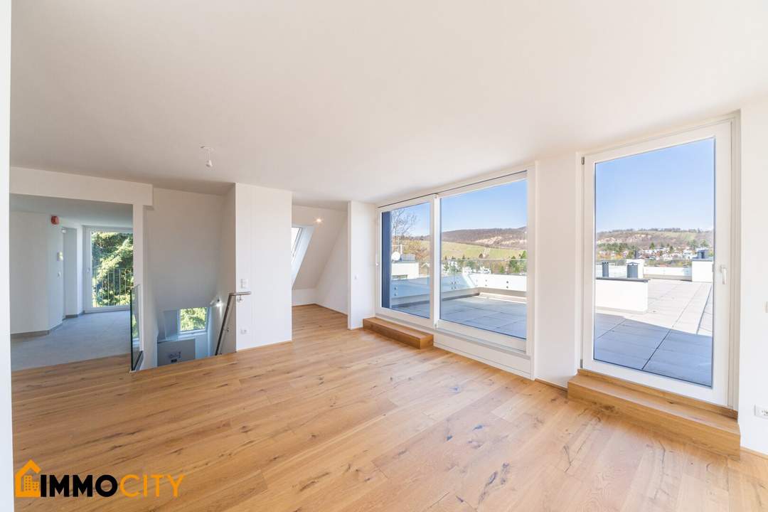Atemberaubender Panoramablick – luxuriöse 3,5-Zimmer-Dachgeschosswohnung mit 96 m² Dachterrasse