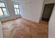 Revitalisiertes Altbaujuwel – alles, was das Herz begehrt! 3-Zimmer-Wohnung mit Klimaanlage, Terrasse, Luftwärmepumpe &amp; edler Ausstattung mit Fischgrätparkett – überzeugen Sie sich selbst