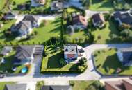 DREI SEEN. EIN ZUHAUSE. – Modernes Wolf Haus mit Garten und Vollkeller in Feld am See