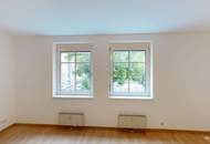 Helle 2,5-Zimmer-Wohnung im 2. Liftstock – ruhige Lage mit Grünblick & optionalem Garagenplatz