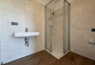 2-Zimmer-Erstbezug mit 25m² Terrasse– Top-Lage &amp; bezugsfertig!