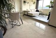 Traumhafte 2-Zimmer-Wohnung mit Penthouse-Flair und Weitblick durch den Wintergarten