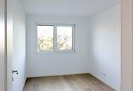 ERSTBEZUG! 4-Zimmer-Wohnung mit Balkon und Parkblick nahe der Donau!
