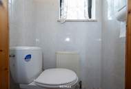 Charmantes Zweifamilienhaus mit traumhaftem Garten und Garage in Christkindl