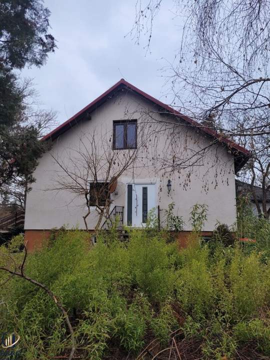 Baugrundstück mit Bestandshaus in Grün- und Ruhelage