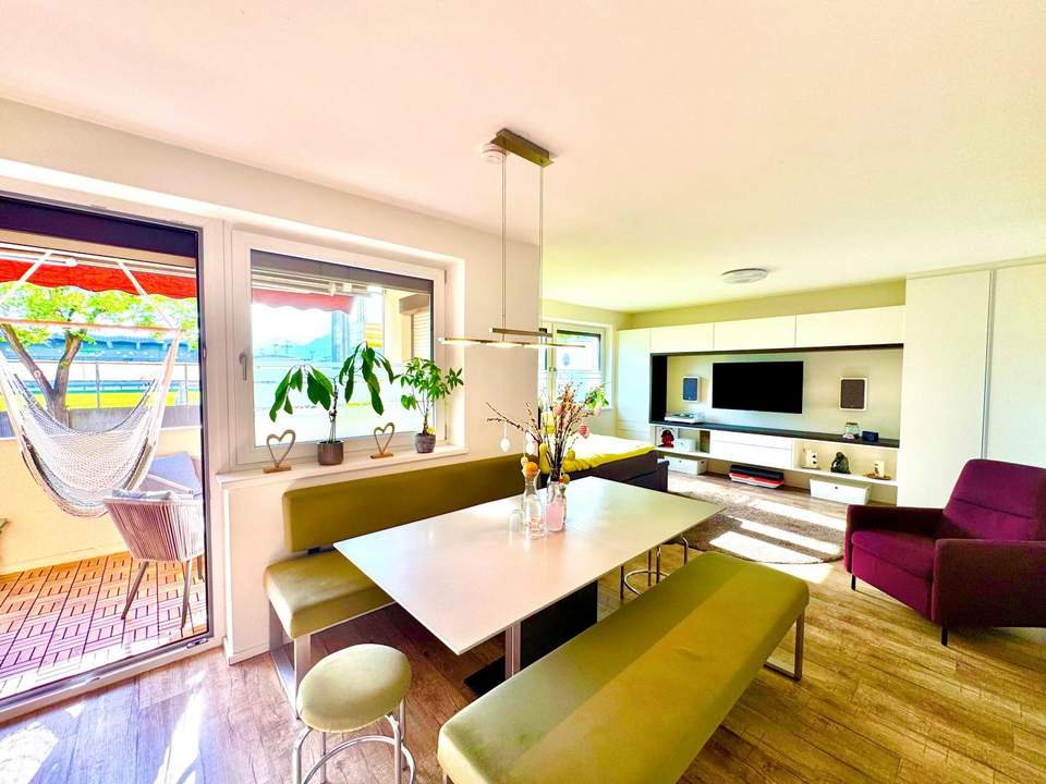 Familienfreundliche 4-Zimmer-Wohnung mit Tiefgaragenabstellplatz, Loggia, Gartenanlage &amp; nachhaltiger Heizung