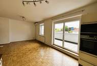 Klimatisierte Dachgeschosswohnung mit großzügiger Dachterrasse