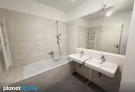 Topwohnung mit großem Balkon – neuwertig, stilvoll, mit Garage – Raumwunder