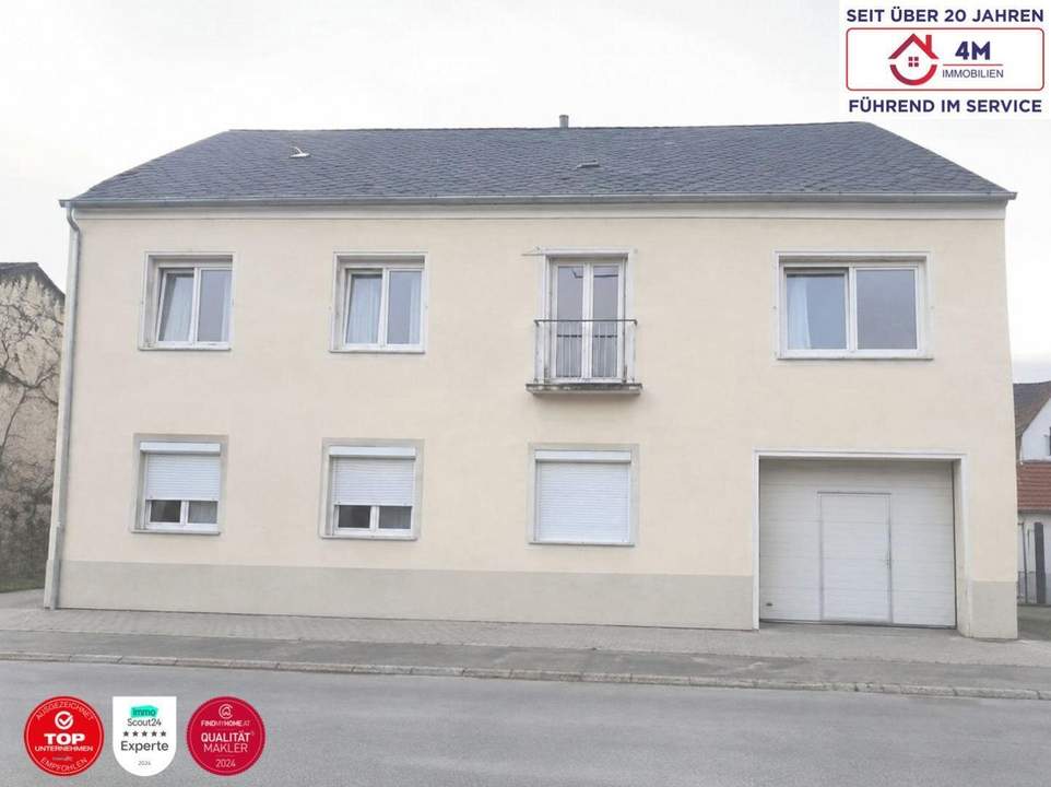 Elegantes Zweifamilienhaus mit privatem Garten – selten, flexibel, wertvoll.