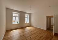 Erstbezug: Stilvolle 3-Zimmer-Wohnung mit Garten und und exklusiver Ausstattung