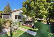 Charmantes Einfamilienhaus mit Kamin, Südterrasse und Garten in ruhiger Wohnlage