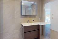 Neubau: 2-Zimmerwohnung mit Garagenplatz und Bergblick!