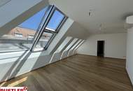 Erstbezugs-Dachgeschosswohnung in zentraler Lage