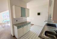 Zentrumsnah wohnen, Ruhe genießen – 3-Zimmer-Dachgeschoß-Wohnung mit Gartenblick