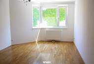 "Familienwohnung mit Schwimmbiotop und Garage!"