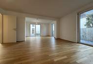 Erstbezug: 3 Zimmer-Mietwohnung mit sonnigen Terrassenflächen und Garten