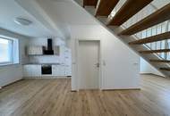 "Großzügige 4-Zimmer-Maisonette mit sonnigem Garten"
